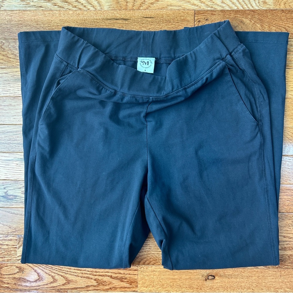 Black Track Pants by [Brand]